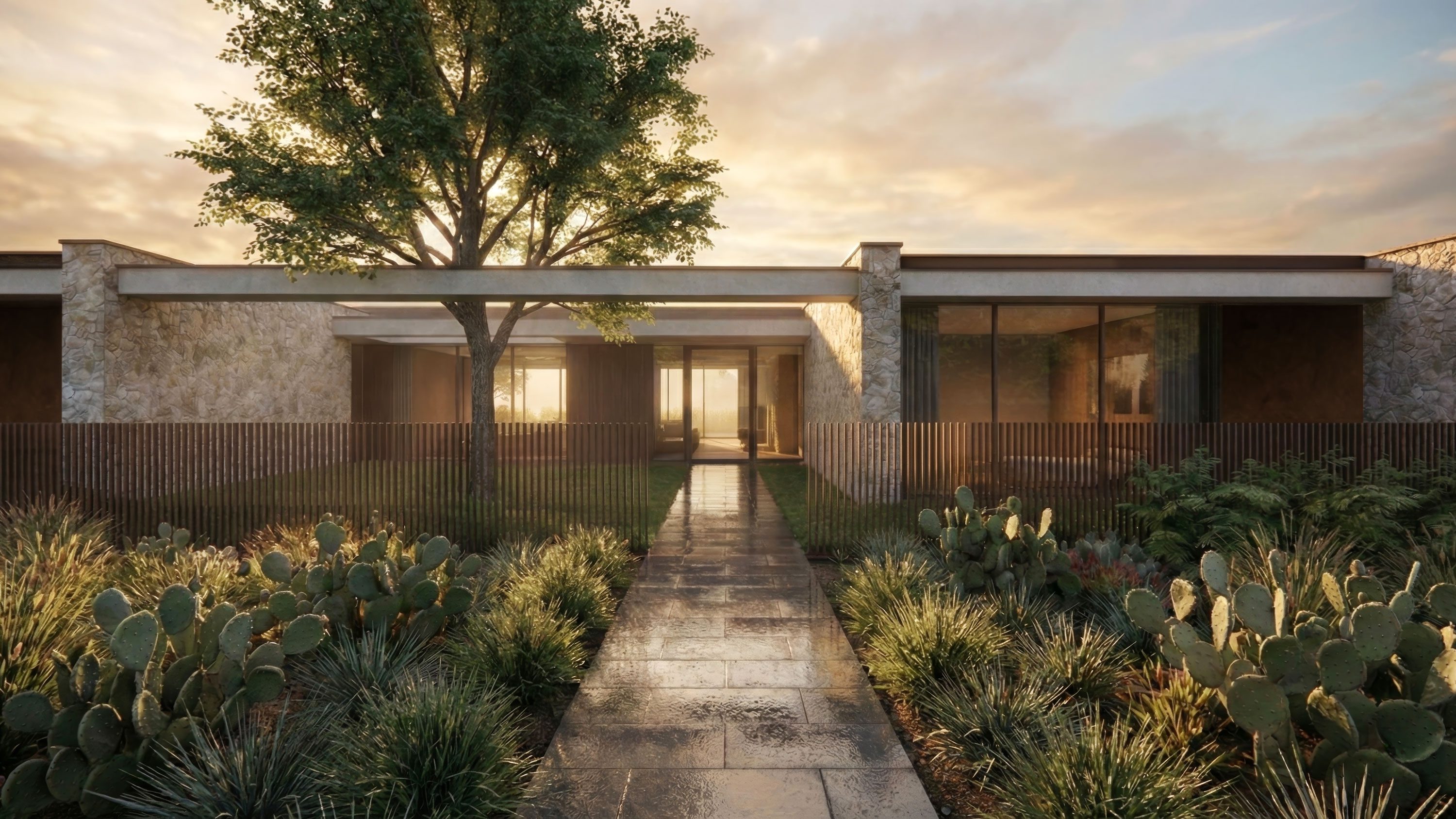Modern single-story home entry with stone facade, wood screen walls, stone path, and native cactus gardens at sunset.